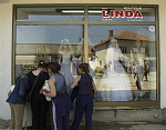 Kosovo trip
A group of young girls check out the latest fashions in a Bridal store window in the town of Gjilan.




